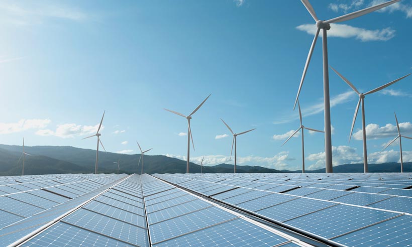 Soft blue Image of wind turbines and solar panels New Fiera Infra Head Looks Beyond Macro ‘Bumps’ After Taking the Helm